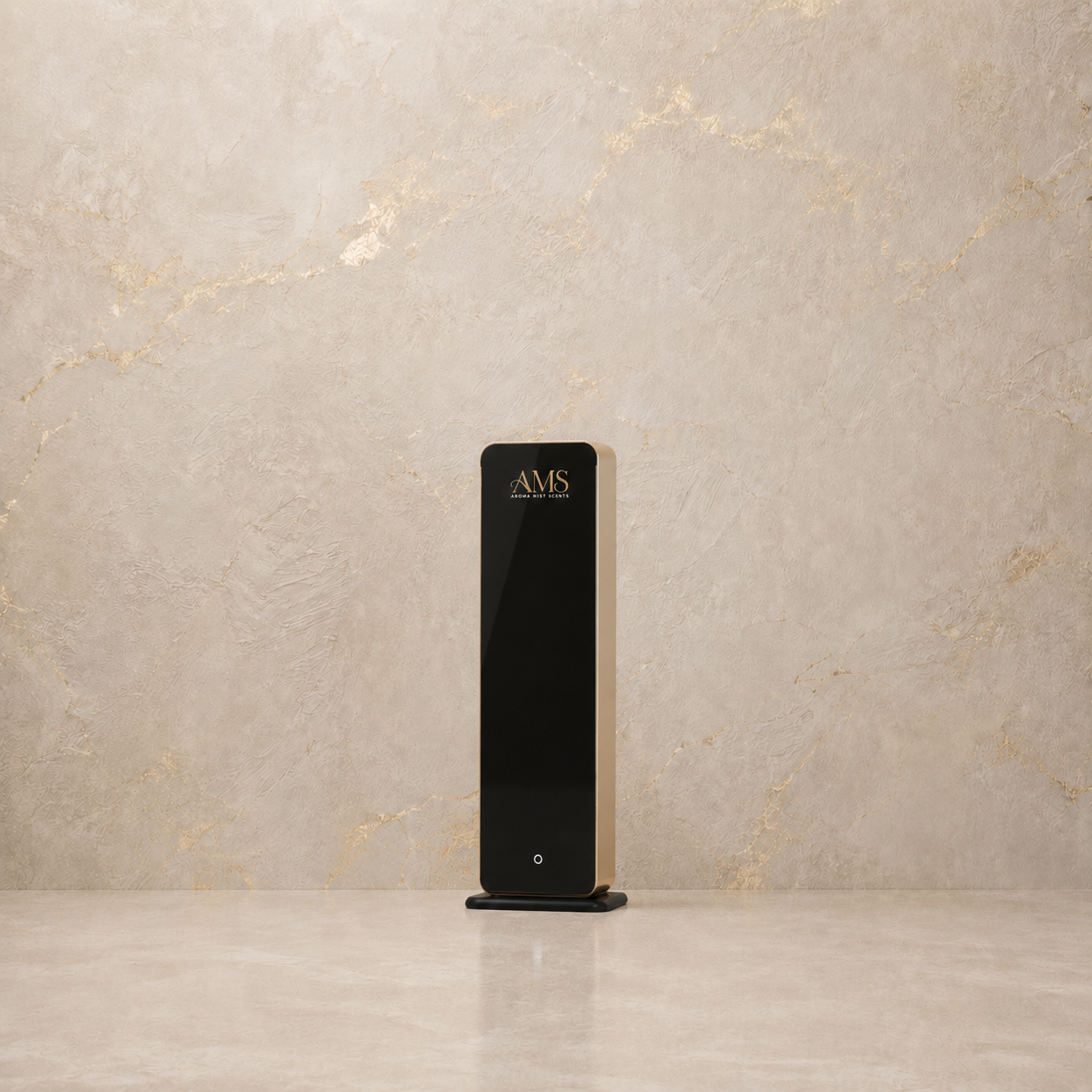 A sleek, modern black rectangular diffuser with gold lettering that reads 'AMS' on the top face, standing on a matching black base against a textured beige marble background.